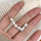 Silver heart-shaped necklace for women